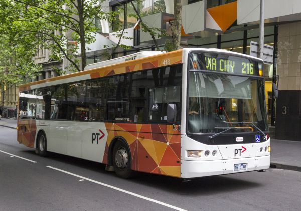 Transdev Melbourne number 413 5913AO Volgren bodied Scania in PTV livery on route 216 in Queen St December 2013